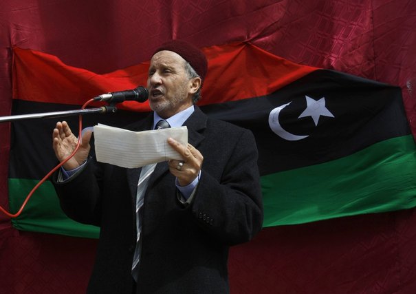 686395_mustafa-abdel-jalil-head-of-the-rebel-national-libyan-council-based-in-the-eastern-rebel-held-city-of-benghazi-talks-to-his-supporters-in-beyda.jpg